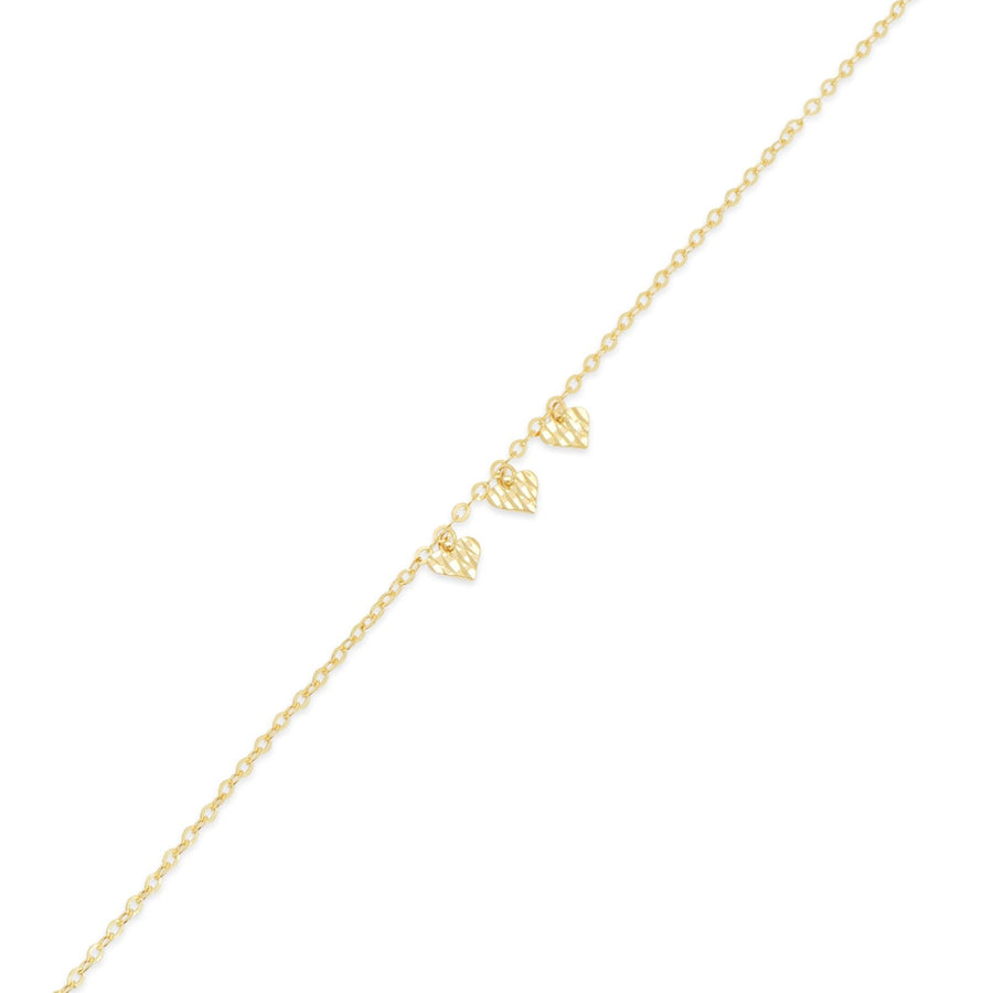 14KB0012. - 14 Karat Yellow Gold Three Diamond Cut Heart Charm Adjustable Bracelet
