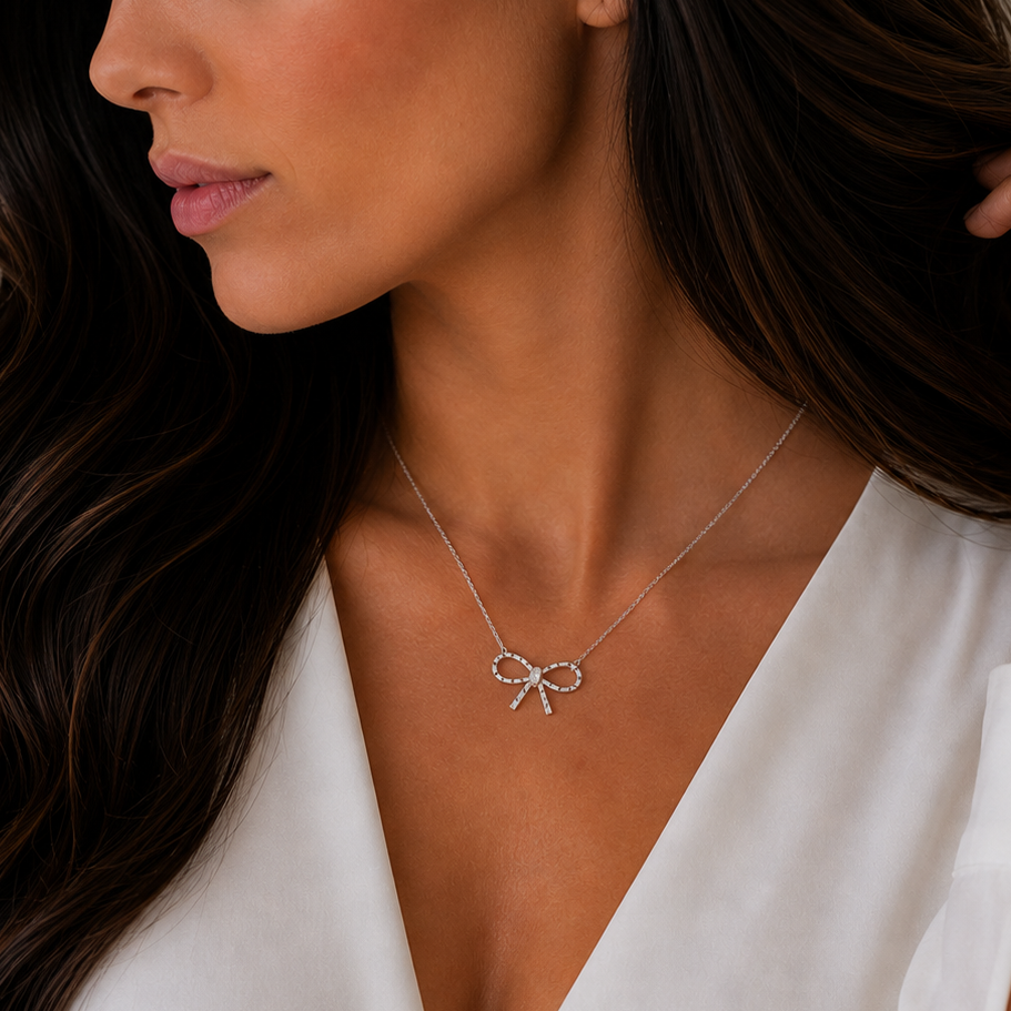 Rhodium Plated 925 Sterling Silver Diamond Cut Dainty Ribbon Bow Necklace - TGN00019